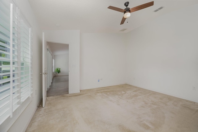 1544 Summit Rd SE, Palm Bay, FL 32909 - carpeted empty room featuring visible vents and ceiling fan