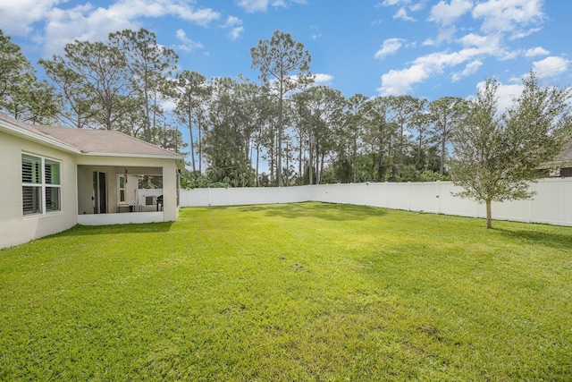 1544 Summit Rd SE, Palm Bay, FL 32909 - view of yard with a sunroom and a fenced backyard