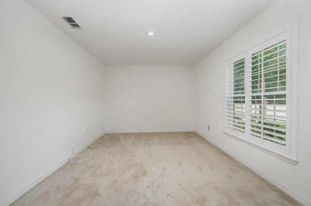 1544 Summit Rd SE, Palm Bay, FL 32909 - empty room with visible vents, carpet floors, and baseboards