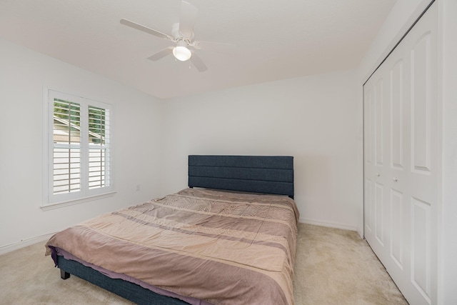 1544 Summit Rd SE, Palm Bay, FL 32909 - carpeted bedroom with baseboards, ceiling fan, and a closet