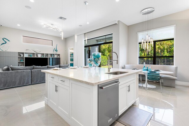 16202 Cabernet Dr, Delray Beach, FL 33446 - kitchen featuring light tile patterned flooring, visible vents, a wealth of natural light, and a sink