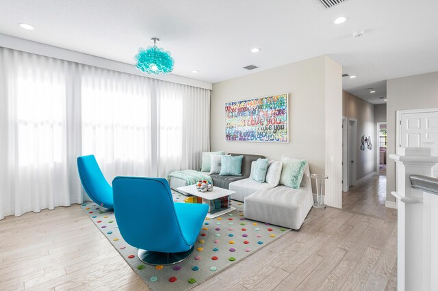 16202 Cabernet Dr, Delray Beach, FL 33446 - living room featuring recessed lighting, wood finished floors, visible vents, and baseboards