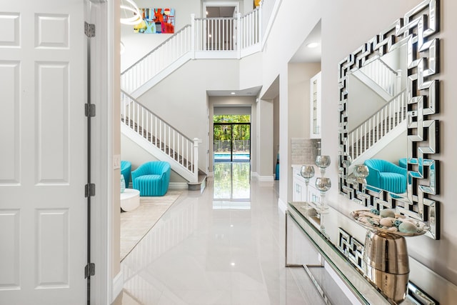 16202 Cabernet Dr, Delray Beach, FL 33446 - tiled foyer entrance with stairway and baseboards