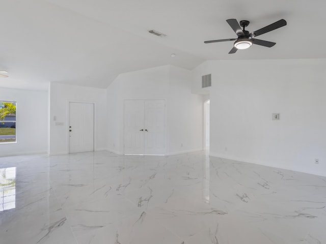 1201 SW Paar Dr, Port Saint Lucie, FL 34953 - empty room featuring marble finish floor, lofted ceiling, a ceiling fan, and visible vents