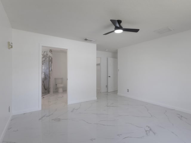 1201 SW Paar Dr, Port Saint Lucie, FL 34953 - unfurnished room featuring baseboards, ceiling fan, marble finish floor, and visible vents