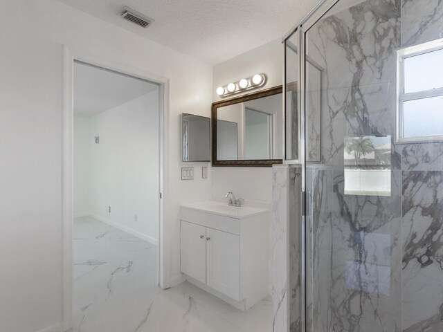 1201 SW Paar Dr, Port Saint Lucie, FL 34953 - full bathroom with a marble finish shower, visible vents, baseboards, marble finish floor, and vanity
