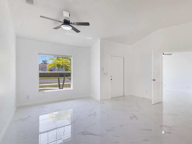 1201 SW Paar Dr, Port Saint Lucie, FL 34953 - spare room featuring ceiling fan, baseboards, and marble finish floor