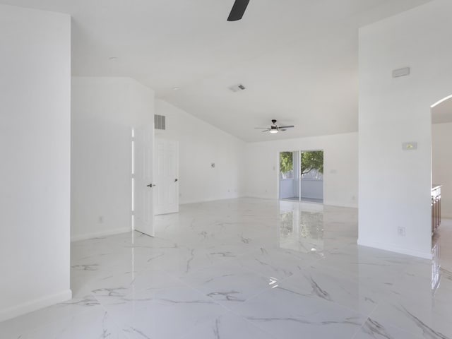 1201 SW Paar Dr, Port Saint Lucie, FL 34953 - spare room featuring vaulted ceiling, visible vents, baseboards, and a ceiling fan