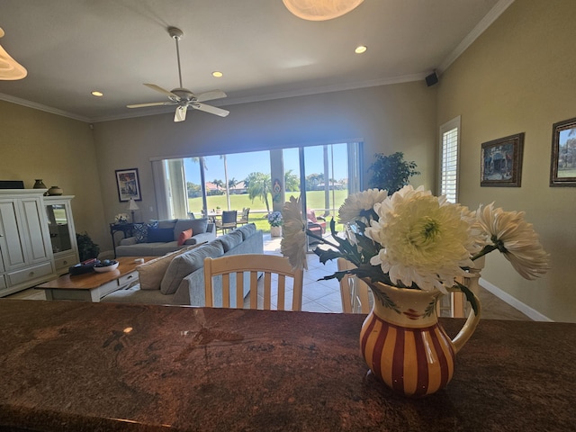 411 NW Stratford Ln, Port Saint Lucie, FL 34983 - dining area with healthy amount of natural light, light tile patterned floors, recessed lighting, ceiling fan, and ornamental molding