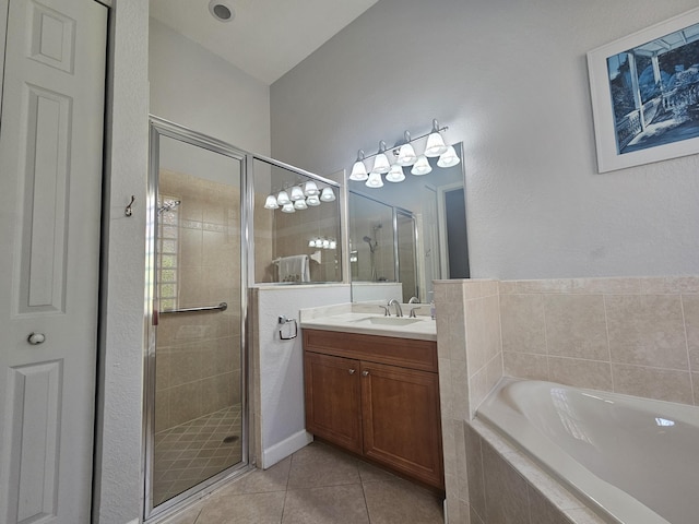 411 NW Stratford Ln, Port Saint Lucie, FL 34983 - full bath with tile patterned floors, a stall shower, a bath, and vanity