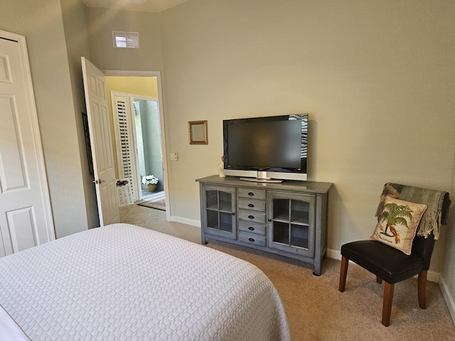 411 NW Stratford Ln, Port Saint Lucie, FL 34983 - bedroom featuring baseboards and carpet floors