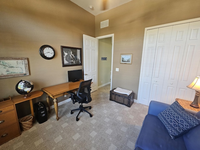 411 NW Stratford Ln, Port Saint Lucie, FL 34983 - carpeted office space with high vaulted ceiling and baseboards
