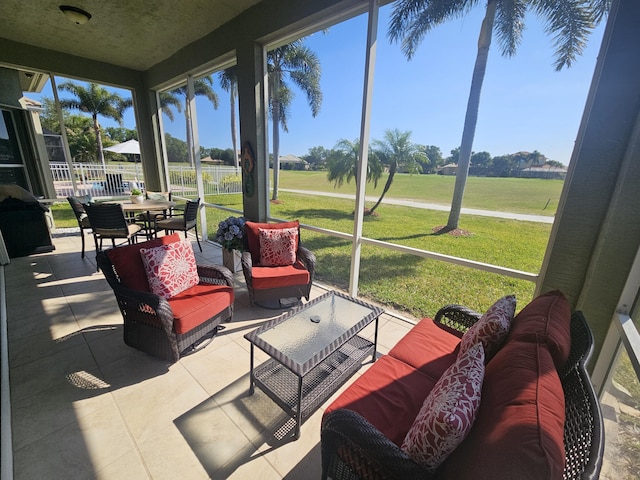 411 NW Stratford Ln, Port Saint Lucie, FL 34983 - sunroom / solarium featuring an outdoor hangout area