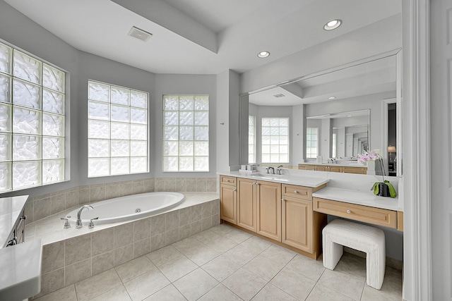 full bathroom featuring recessed lighting, vanity, tile patterned floors, visible vents, and a garden tub