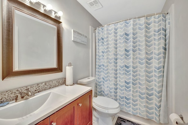 2190 Discovery Cir W, Deerfield Beach, FL 33442 - full bath featuring vanity, visible vents, curtained shower, and toilet