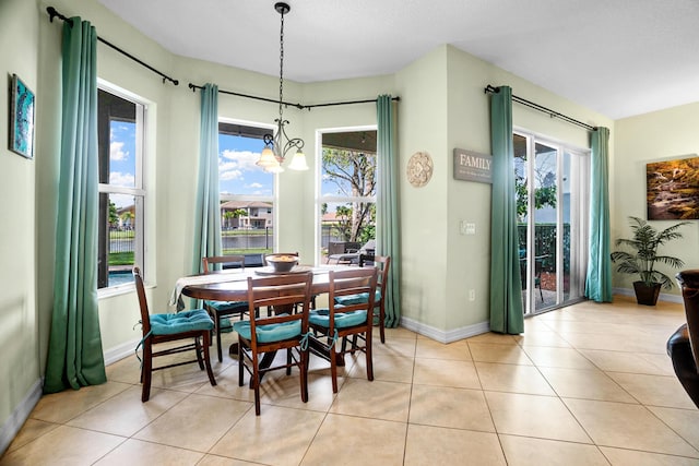 8207 Venosa Haven Ter, Boynton Beach, FL 33473 - dining room with plenty of natural light, baseboards, and light tile patterned floors
