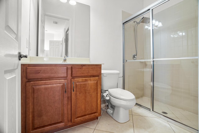 8207 Venosa Haven Ter, Boynton Beach, FL 33473 - full bathroom with visible vents, tile patterned flooring, a shower stall, and toilet
