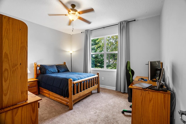 8207 Venosa Haven Ter, Boynton Beach, FL 33473 - bedroom with ceiling fan, baseboards, a textured ceiling, and light colored carpet