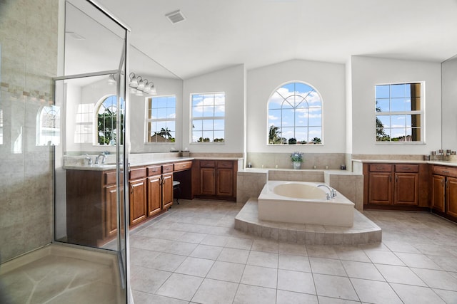 8207 Venosa Haven Ter, Boynton Beach, FL 33473 - full bath with vaulted ceiling, visible vents, a wealth of natural light, and vanity