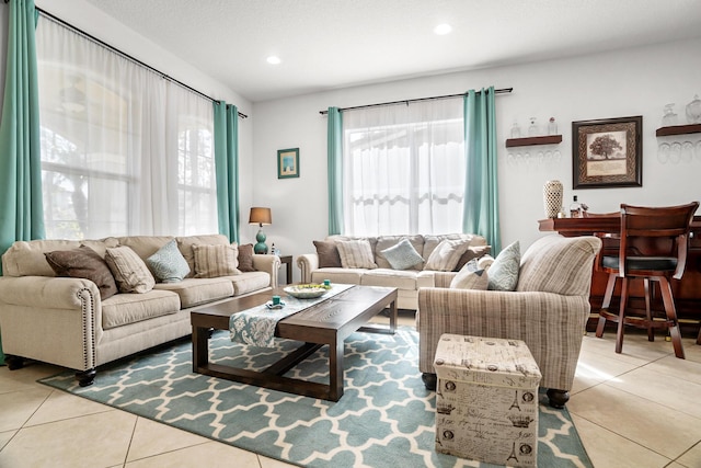 8207 Venosa Haven Ter, Boynton Beach, FL 33473 - living room with recessed lighting and light tile patterned floors