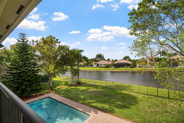 8207 Venosa Haven Ter, Boynton Beach, FL 33473 - view of swimming pool with a fenced backyard, a yard, a residential view, and a water view