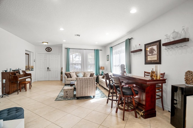 8207 Venosa Haven Ter, Boynton Beach, FL 33473 - living room featuring recessed lighting, visible vents, and light tile patterned floors