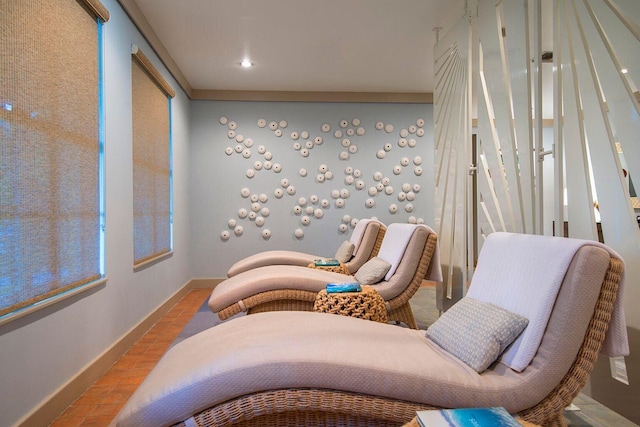sitting room featuring baseboards, wood finished floors, and recessed lighting