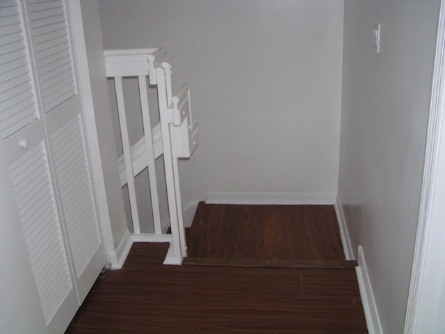 312 River Bluff Ln, Royal Palm Beach, FL 33411 - stairway featuring wood finished floors and baseboards
