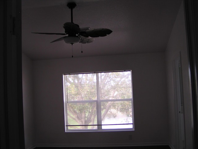 312 River Bluff Ln, Royal Palm Beach, FL 33411 - detailed view of ceiling fan and baseboards