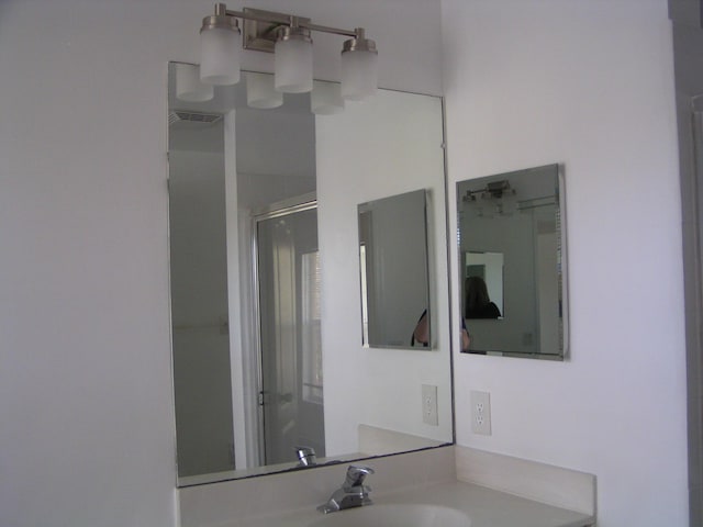 312 River Bluff Ln, Royal Palm Beach, FL 33411 - bathroom with a stall shower and vanity