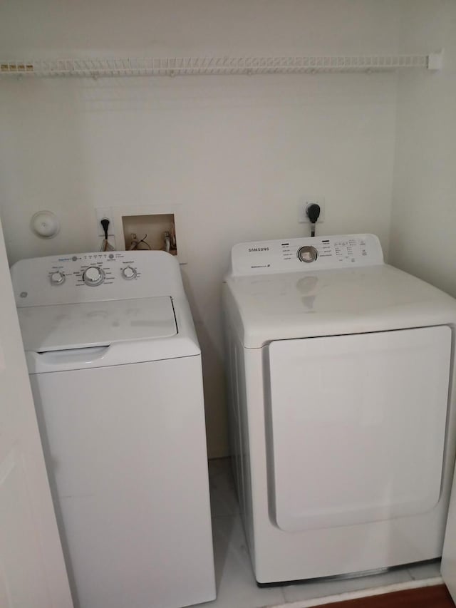 312 River Bluff Ln, Royal Palm Beach, FL 33411 - washroom featuring separate washer and dryer