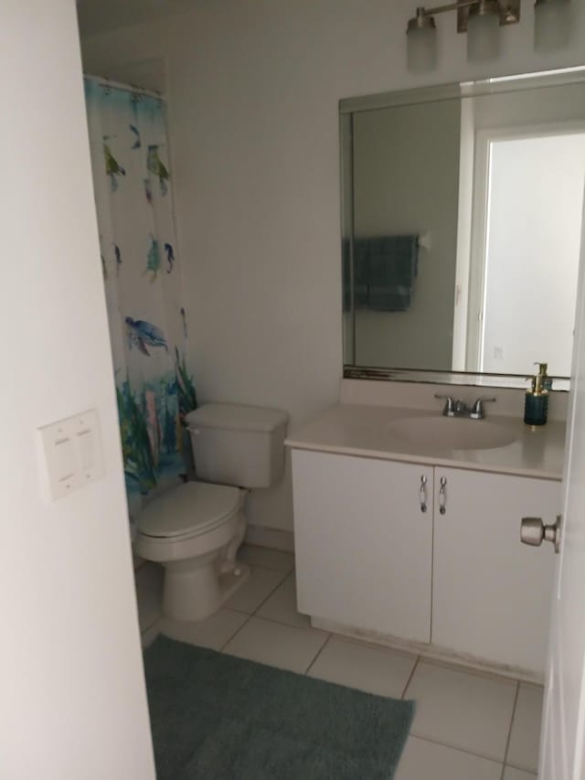 312 River Bluff Ln, Royal Palm Beach, FL 33411 - bathroom with tile patterned flooring, vanity, and a shower with shower curtain