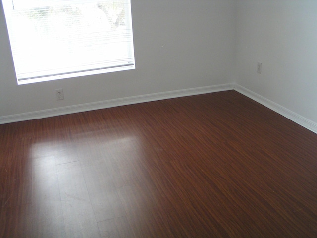 312 River Bluff Ln, Royal Palm Beach, FL 33411 - unfurnished room featuring dark wood-style floors