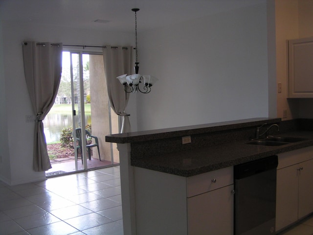 312 River Bluff Ln, Royal Palm Beach, FL 33411 - kitchen featuring stainless steel dishwasher, dark countertops, a peninsula, white cabinets, and light tile patterned flooring