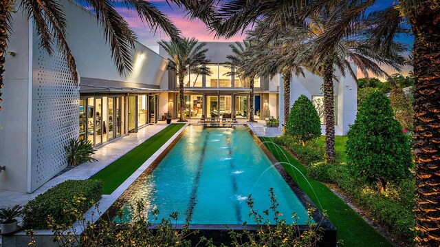 pool featuring a patio area