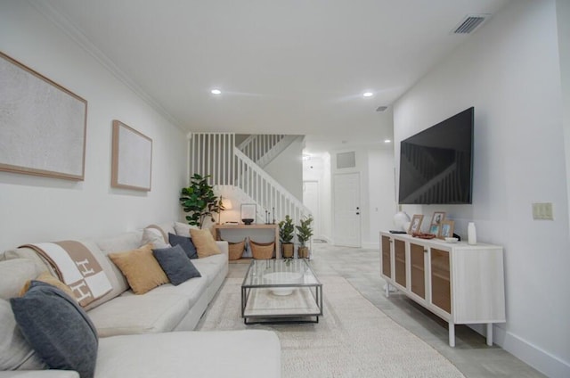 living area featuring crown molding, visible vents, recessed lighting, stairway, and baseboards