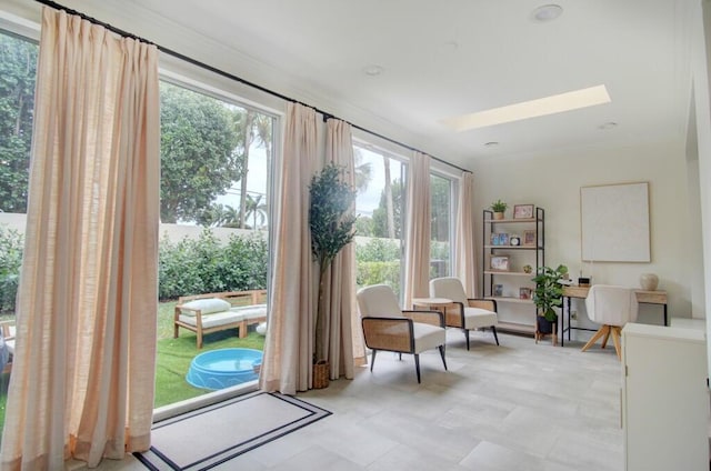 sitting room featuring a skylight