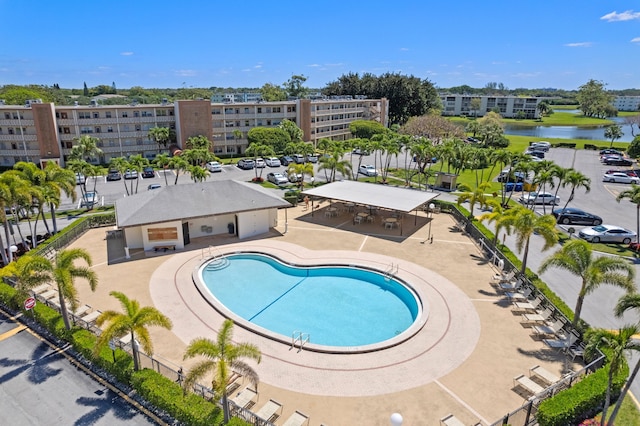 community pool featuring a water view