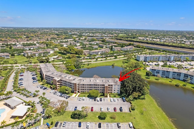 drone / aerial view with a water view