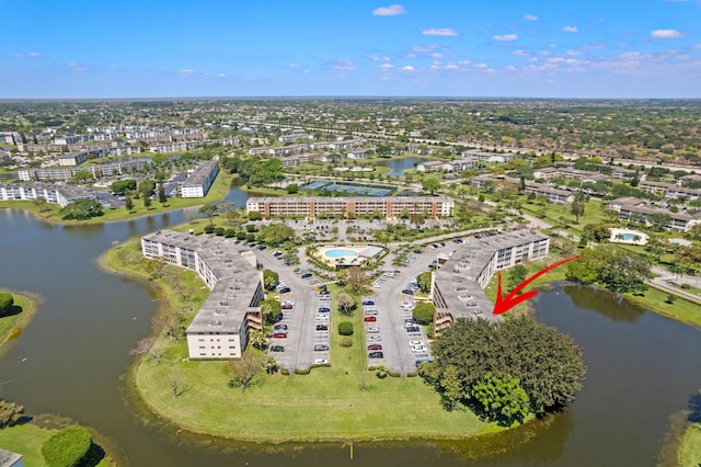 bird's eye view with a water view