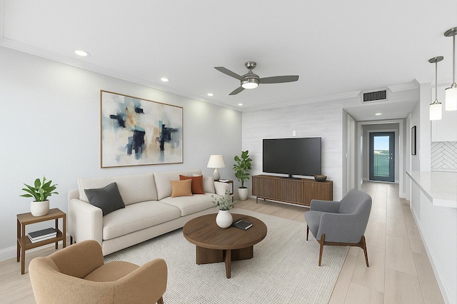 living room with ceiling fan, visible vents, and recessed lighting