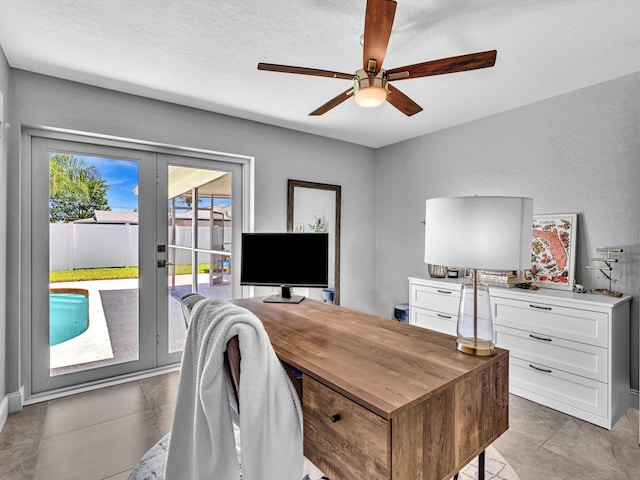 office area featuring french doors and a ceiling fan