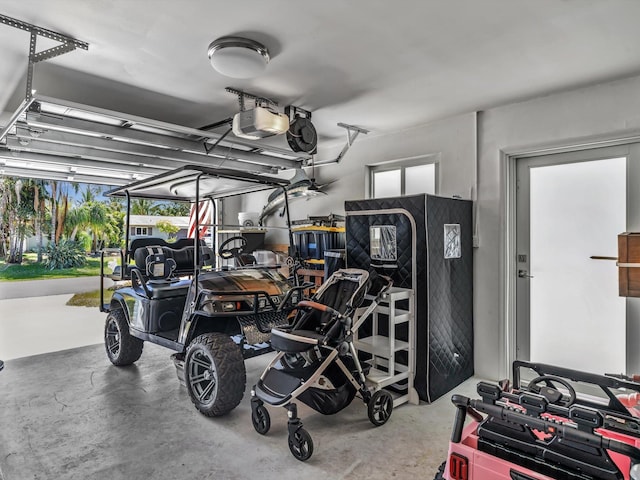 garage featuring a garage door opener