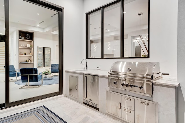 1133 NE 3rd Ave, Boca Raton, FL 33432 - bar with refrigerator, marble finish floor, built in features, and a sink