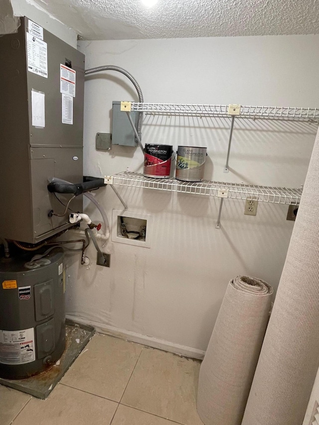 utility room with electric water heater