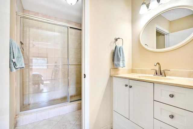 124 Mayfair Ln, Boynton Beach, FL 33426 - bathroom featuring vanity, a stall shower, and tile patterned flooring