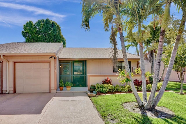 124 Mayfair Ln, Boynton Beach, FL 33426 - ranch-style home with a garage, driveway, a front lawn, a shingled roof, and stucco siding
