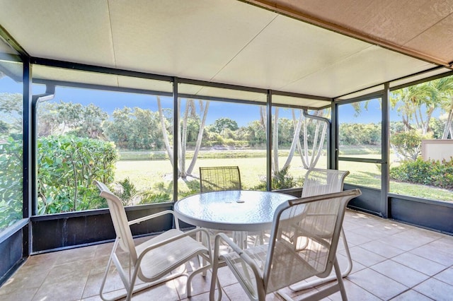 124 Mayfair Ln, Boynton Beach, FL 33426 - sunroom with plenty of natural light and view of scattered trees