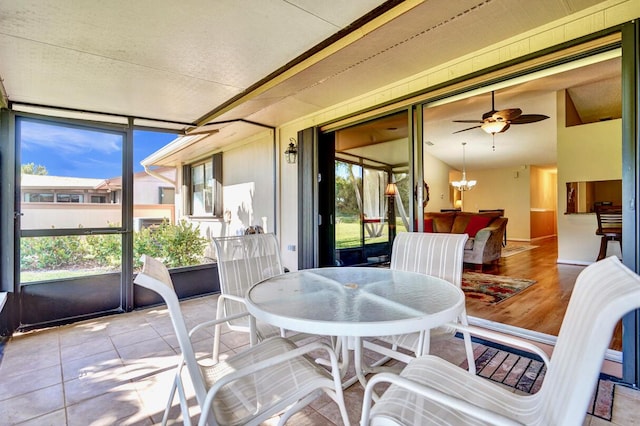 124 Mayfair Ln, Boynton Beach, FL 33426 - sunroom featuring outdoor dining space and a ceiling fan