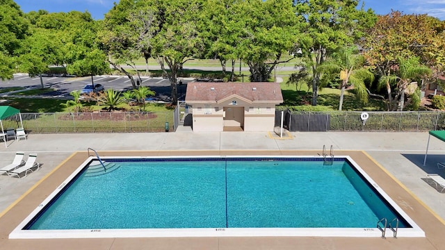 124 Mayfair Ln, Boynton Beach, FL 33426 - community pool featuring a patio